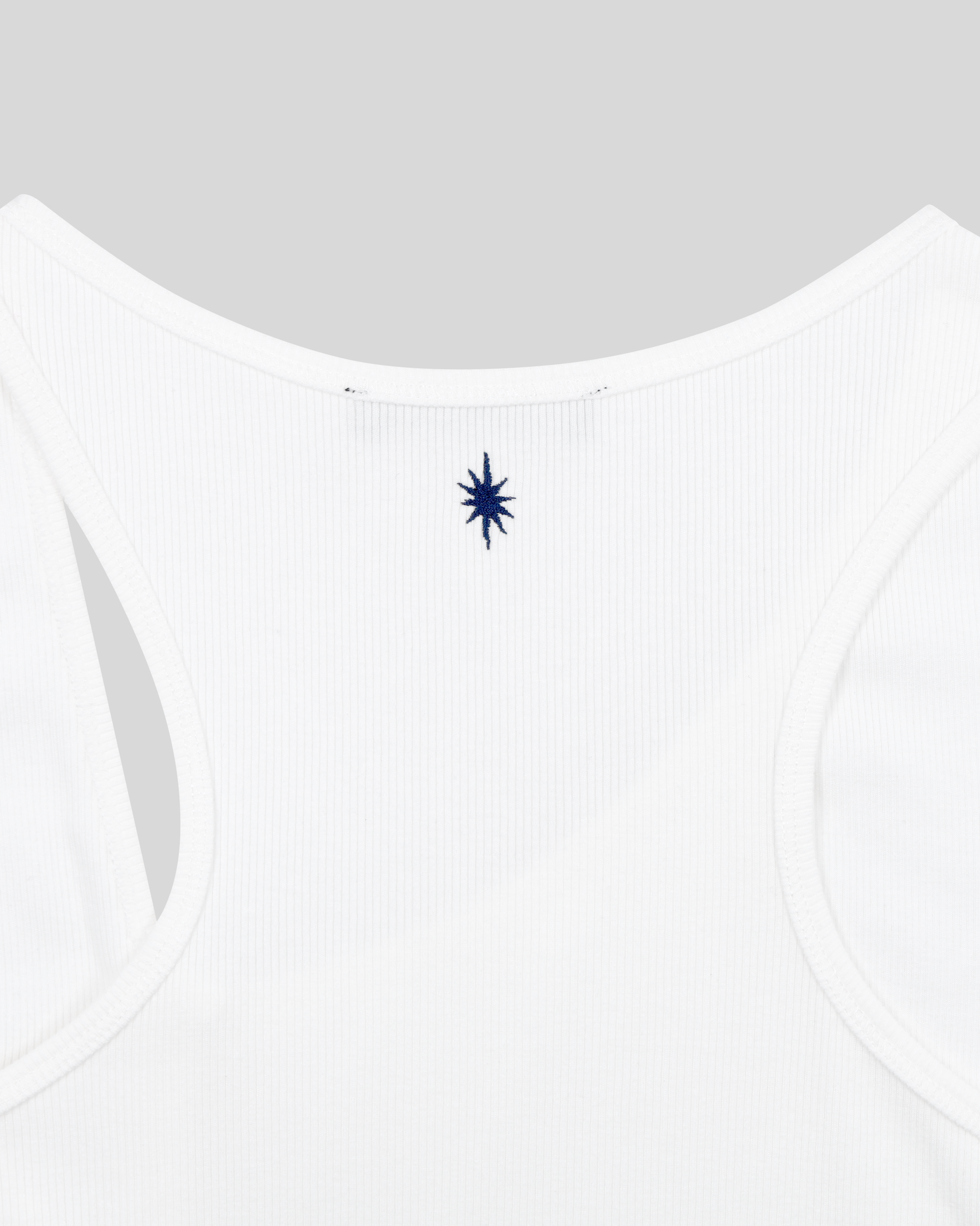 ASYMMETRICAL TANK TOP